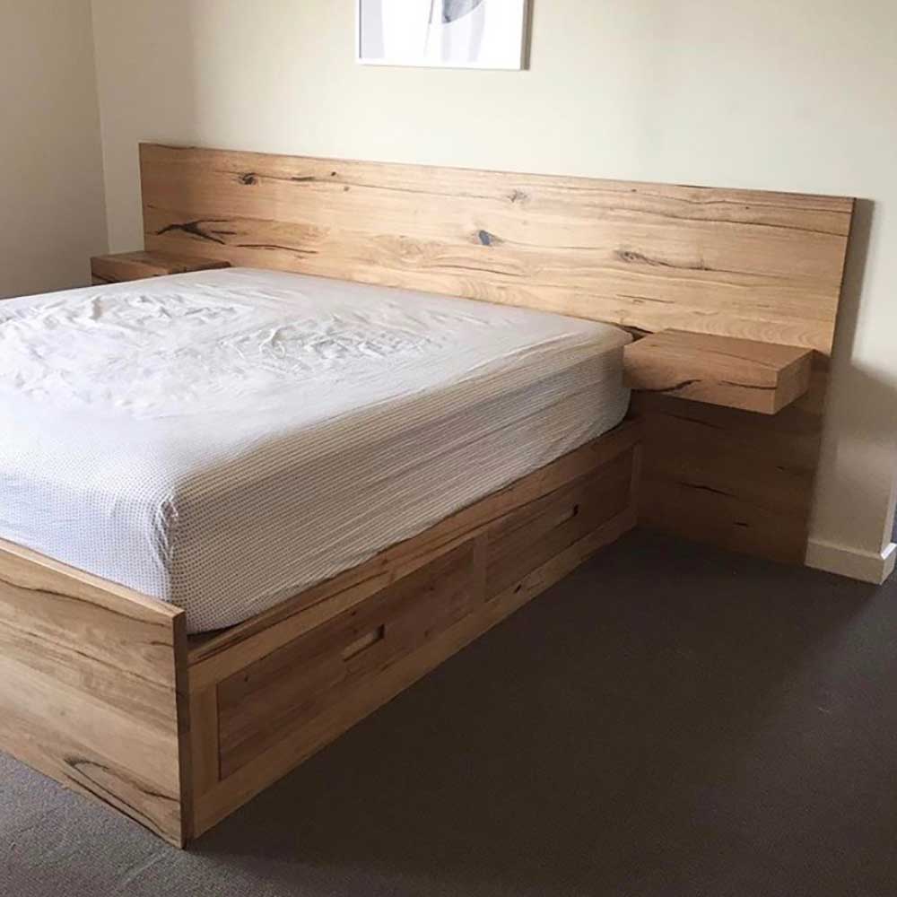 Bedroom: Wormy chestnut bed with bedsides and storage drawers