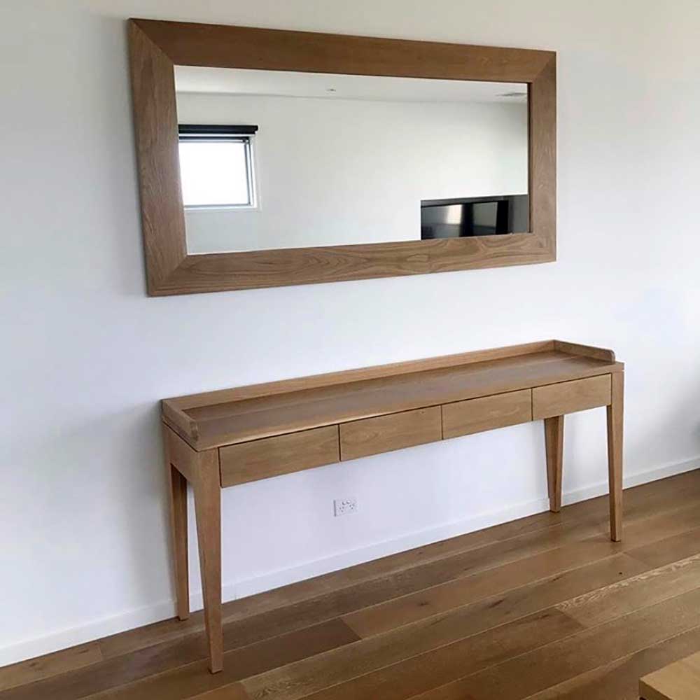Lounge: American oak sideboard with matching mirror