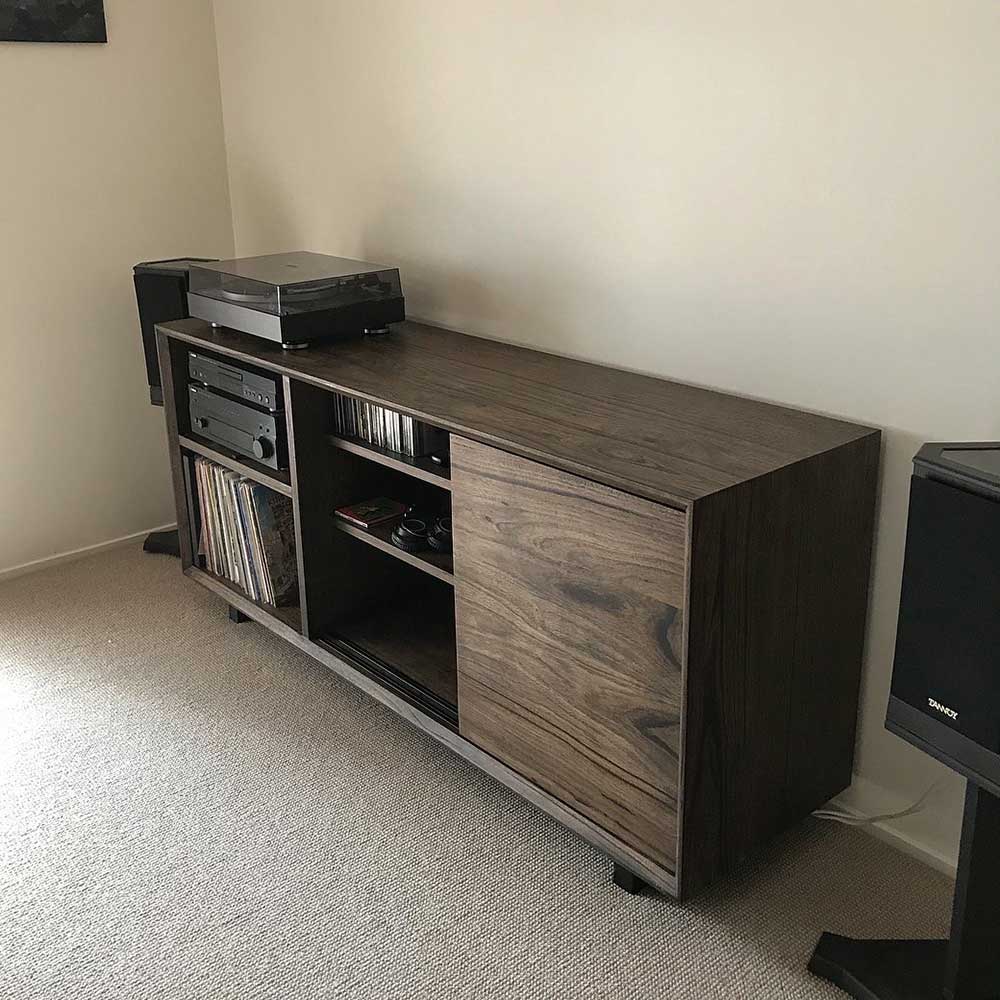 Lounge: Darkened recycled messmate record/music cabinet