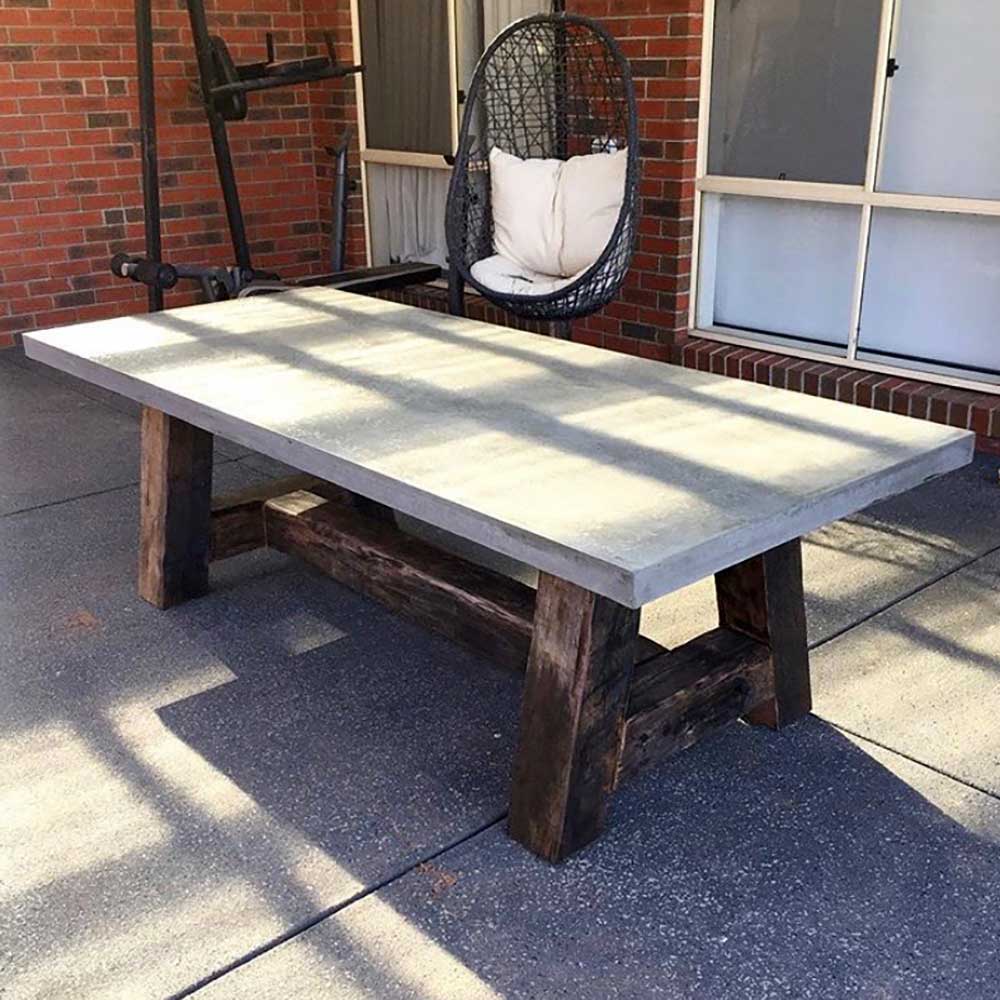 Outdoor: Recycled ironwork base (reclaimed from bridge beams) with a concrete top