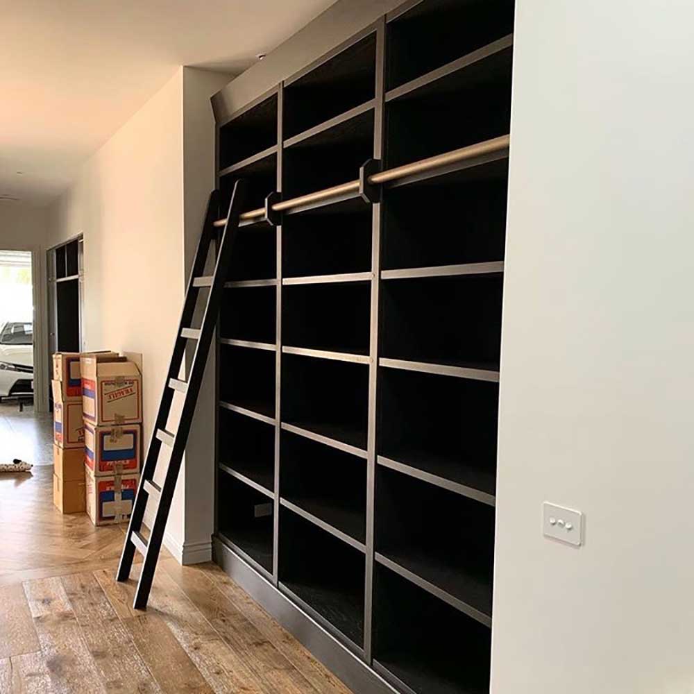 Study: Built-in bookshelf with ladder