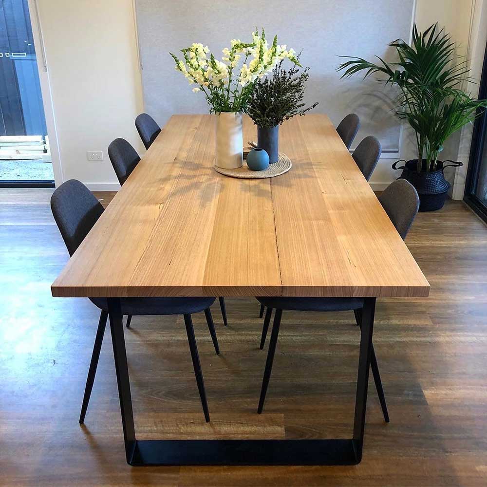 Table: Australian chestnut dining table with custom metal legs